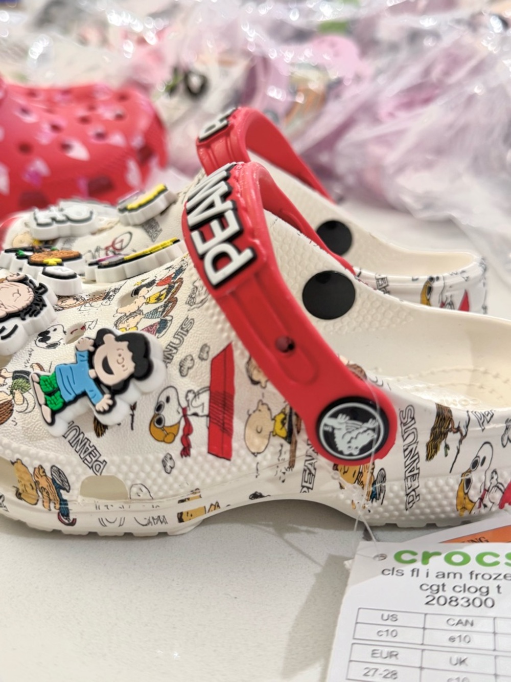 CROCS Kids Peanuts Limited Edition Clog in White with Red Strap